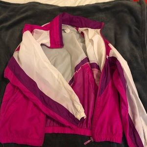 this jacket is a vintage adidas windbreaker